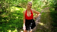 Blonde is flashing her big boobs in the outdoors